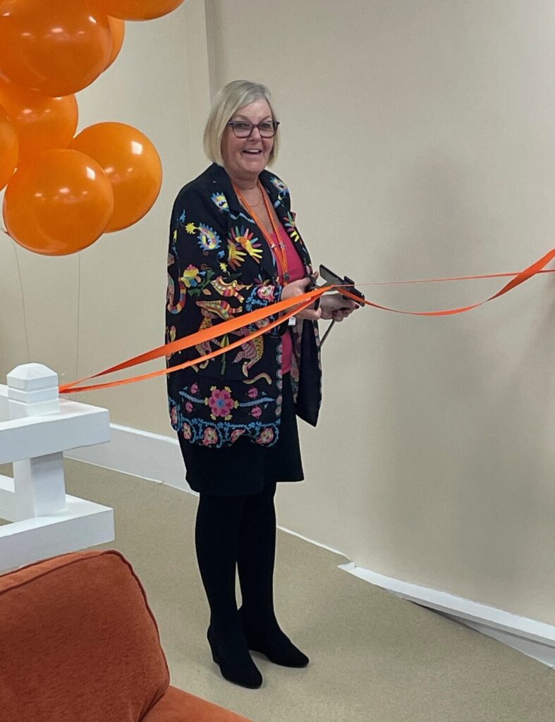 IMG_1088 CEO Ruth Fox officially reopening Footprints Community Cafe in November 2024.